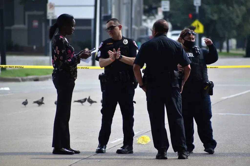 Police officers collecting evidence.