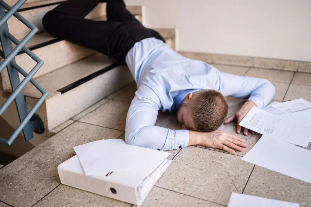 A man who has fallen down the stairs.
