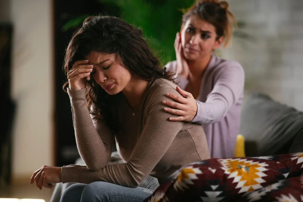 Upset woman dealing with PTSD after a car accident.