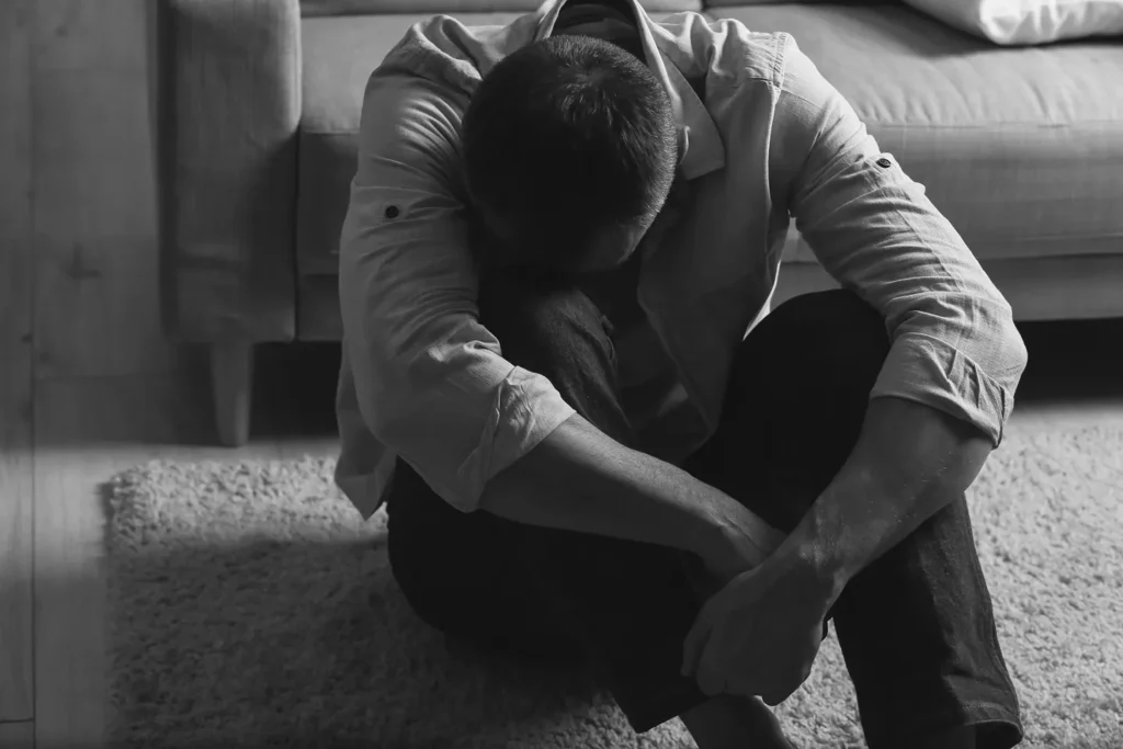 A man fighting his PTSD symptoms.