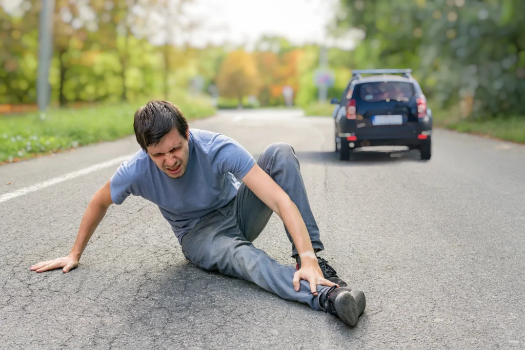 A pedestrian hit by a car that drove away from the scene.