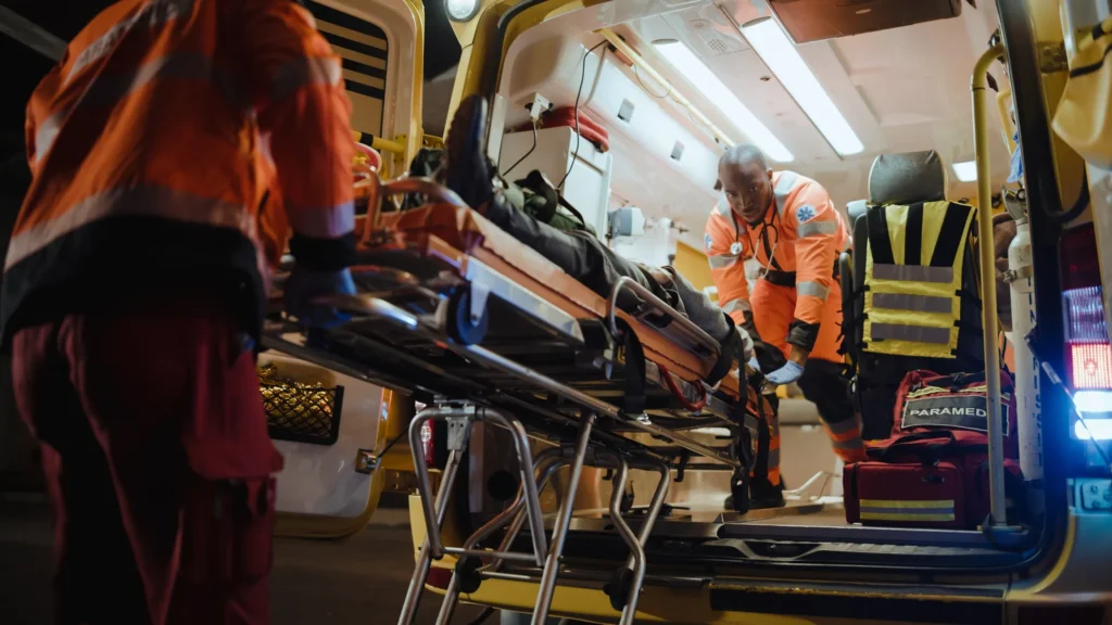 Someone getting into an ambulance. 